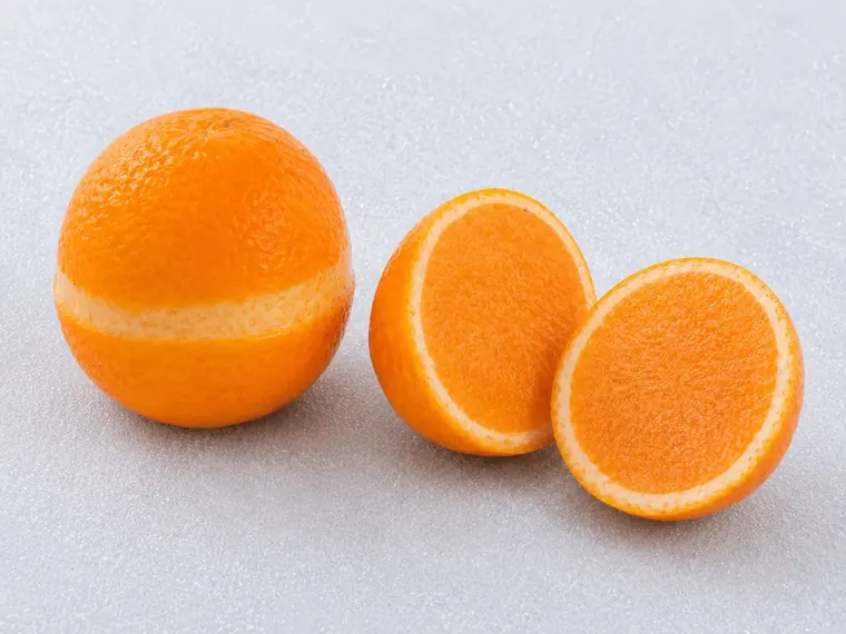 Orange, frozen fruit filled with its own sorbet
